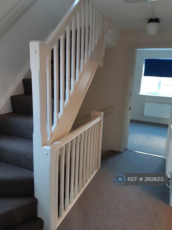 1st Floor Landing With Stairs To 2nd Floor