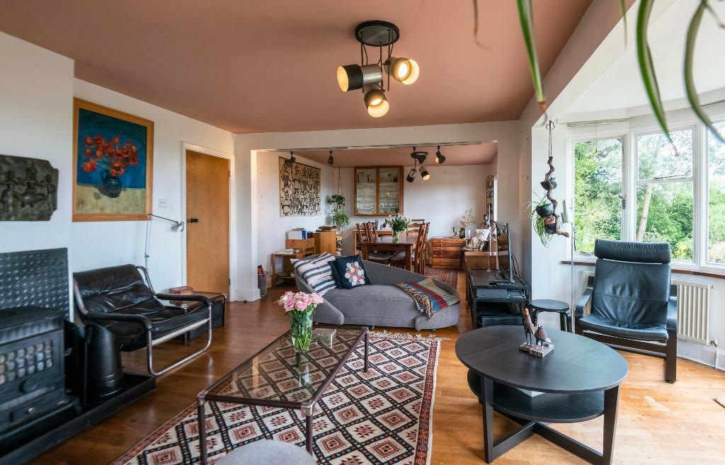 Sitting room and dining room with views