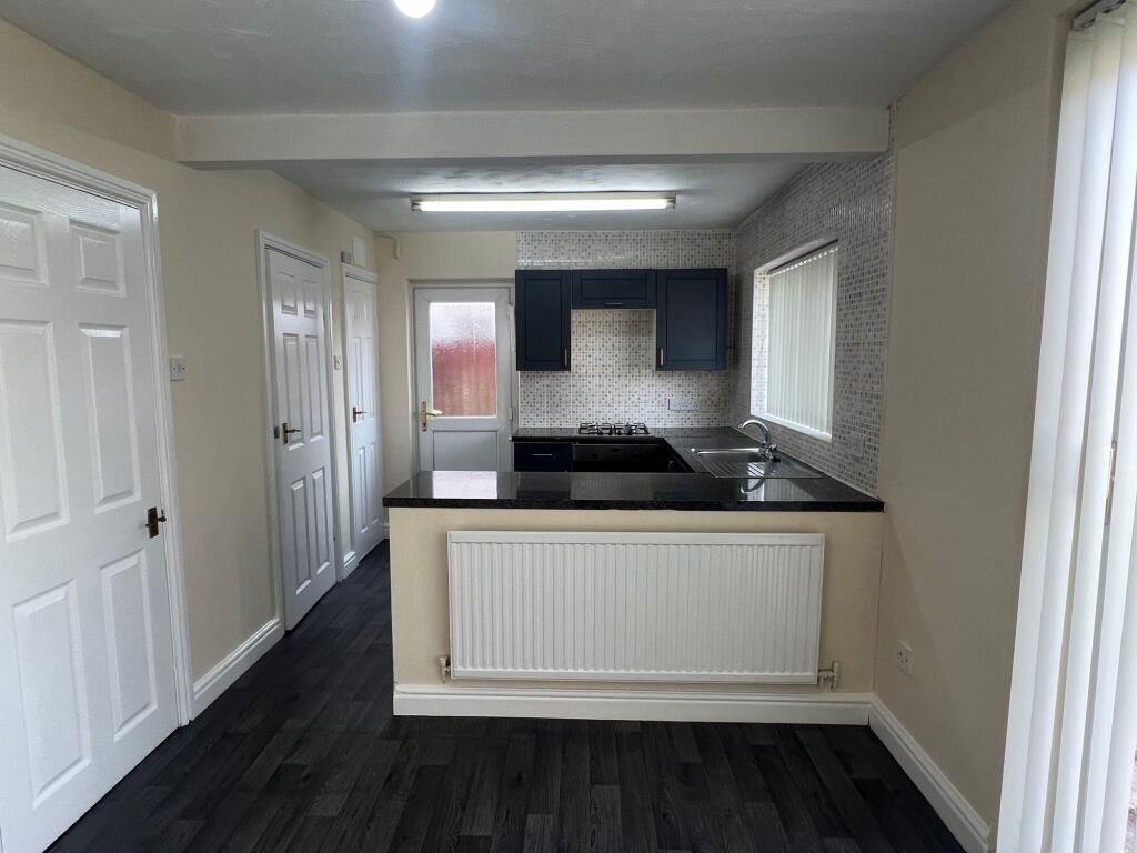 Open plan dining/kitchen