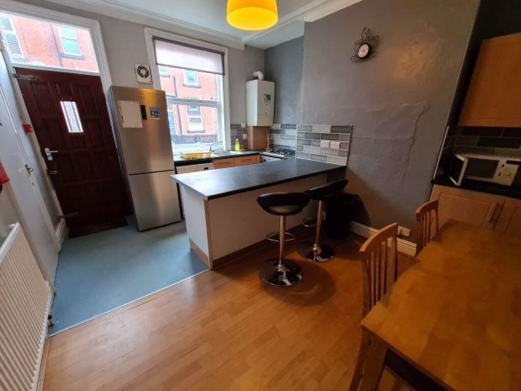 A bright and functional kitchen featuring a bre...