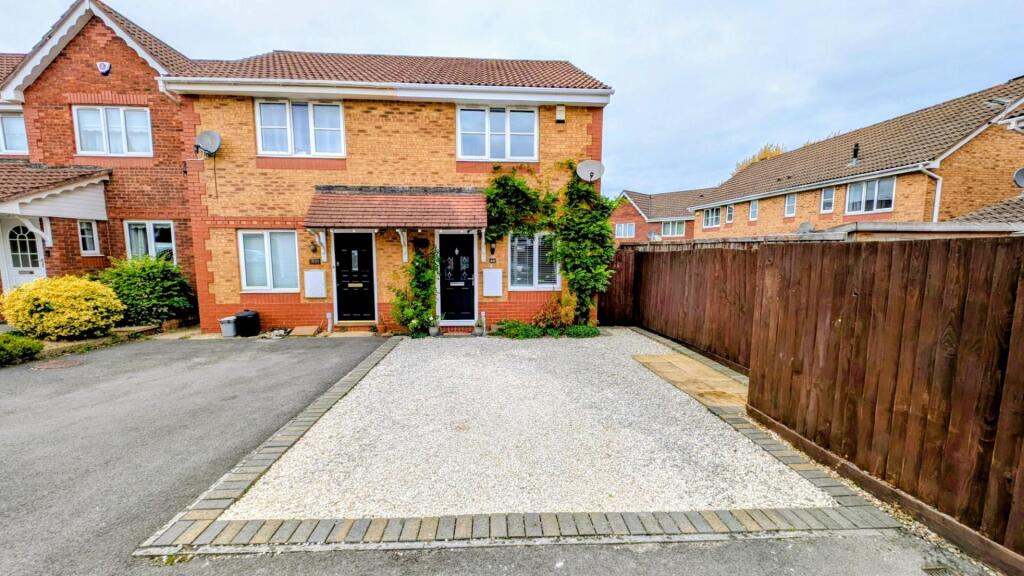 44 Coopers Drive front shot d.jpg