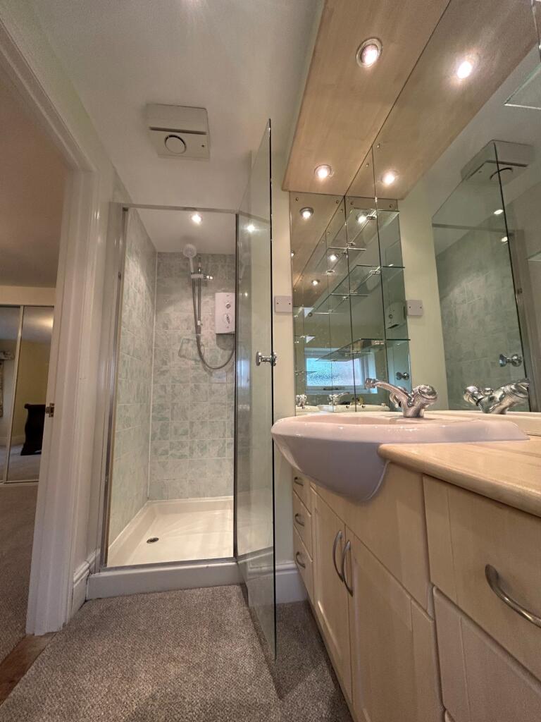 Master en-suite facing shower