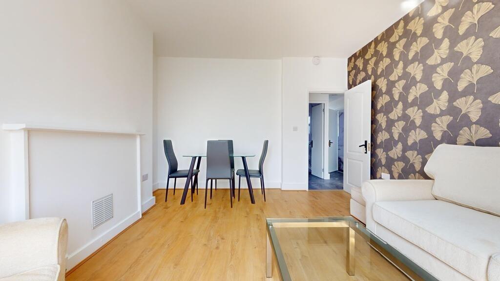 A bright and modern living room featuring clean...