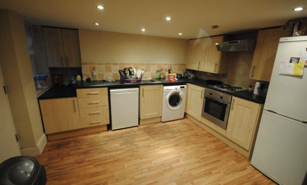 A modern, well-maintained kitchen with ample ca...