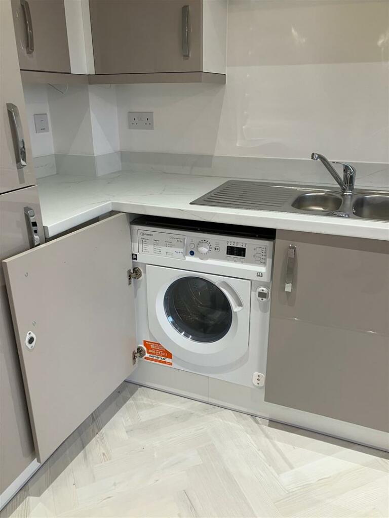 Integrated washer dryer