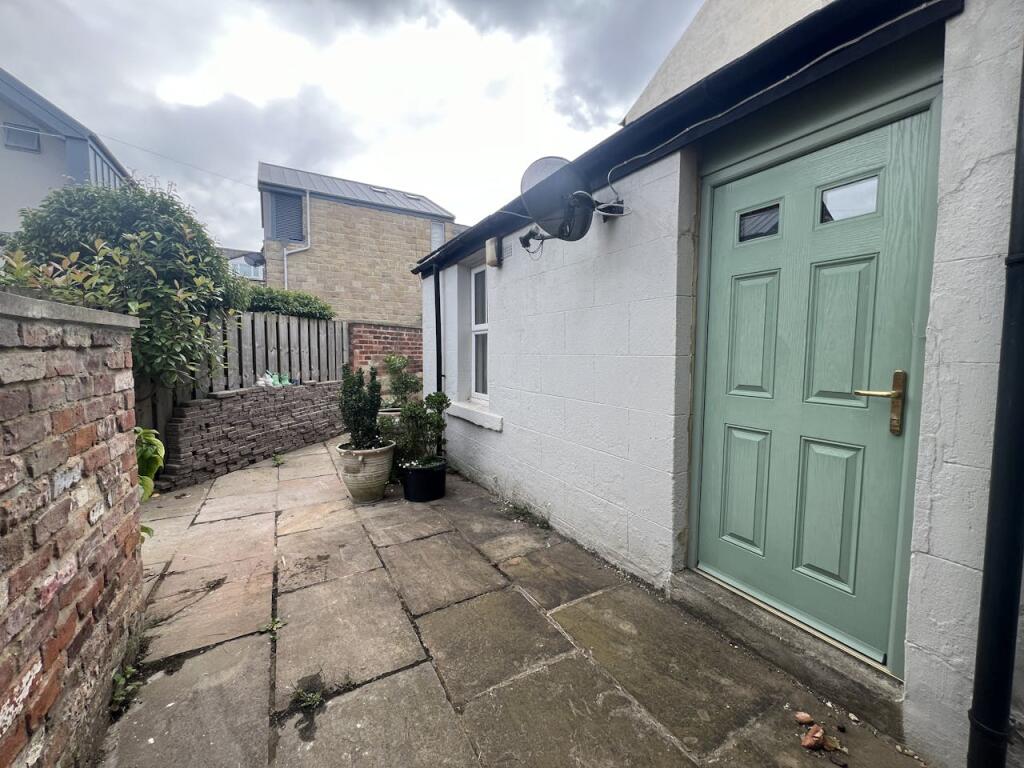 Rear Paved Garden Area