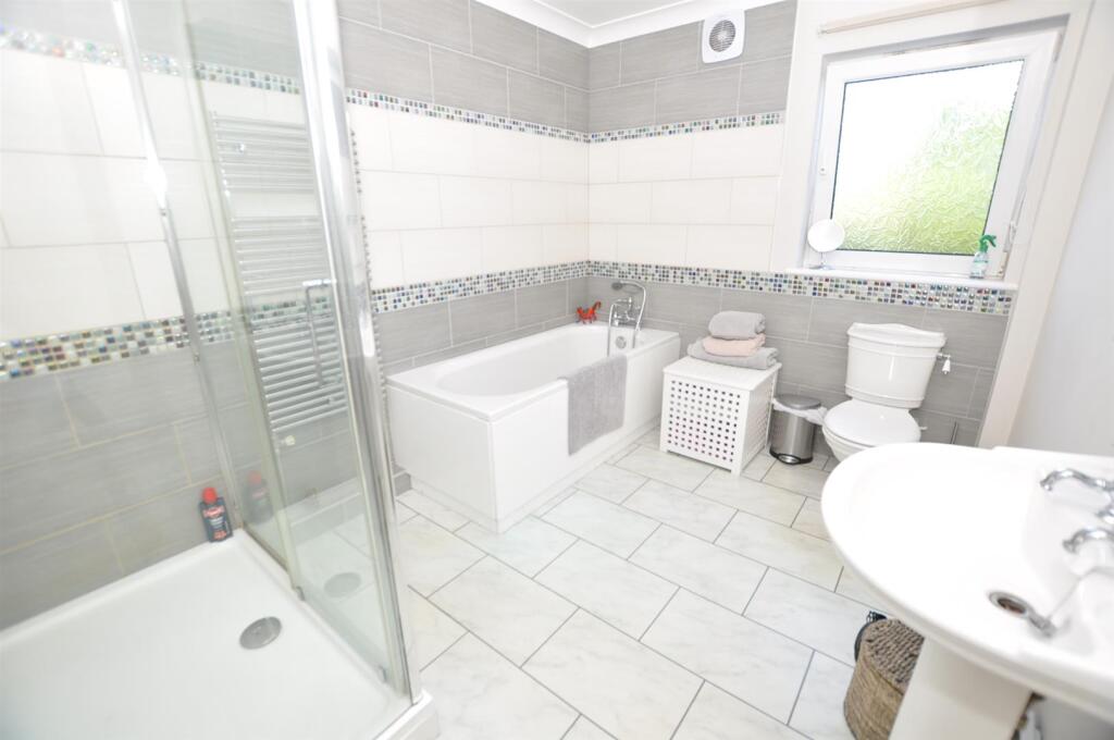 Family Bathroom/Shower Room/WC 2.39m x 3.26m