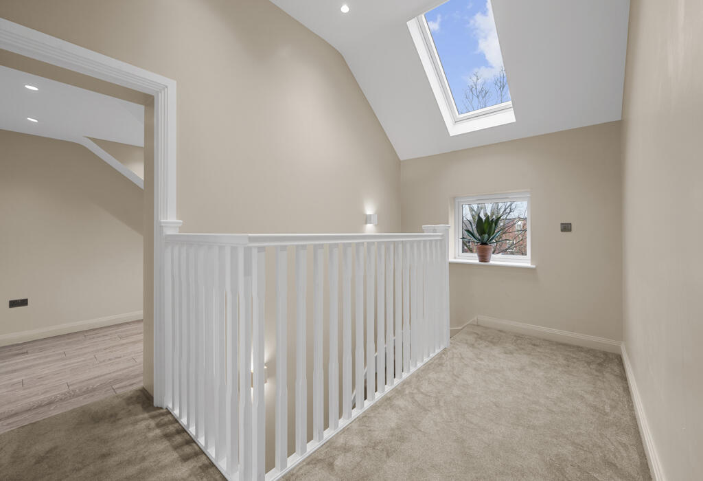 Bright and airy top floor hallway