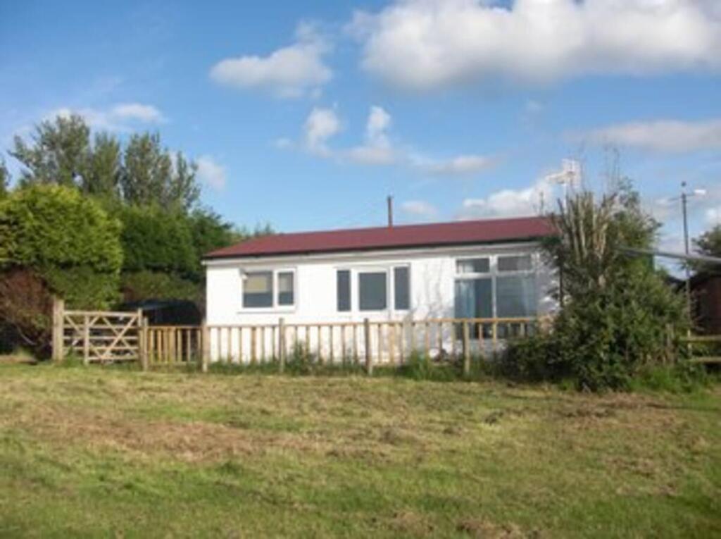 Front of lodge from field.jpg