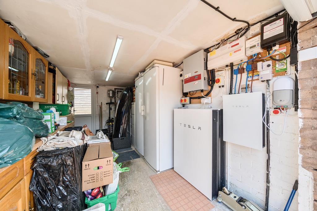 Garage and Tesla charging supply units