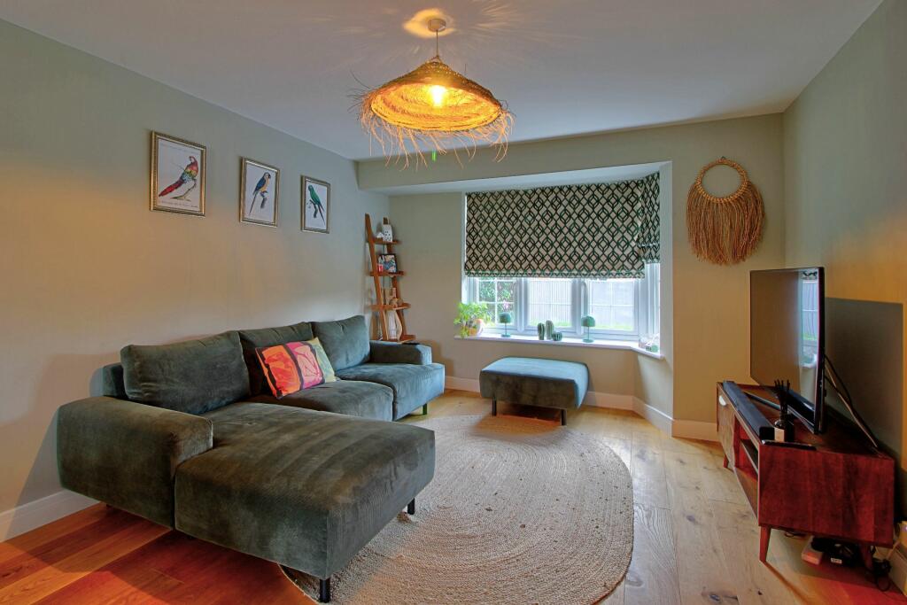 Living room with half bay window