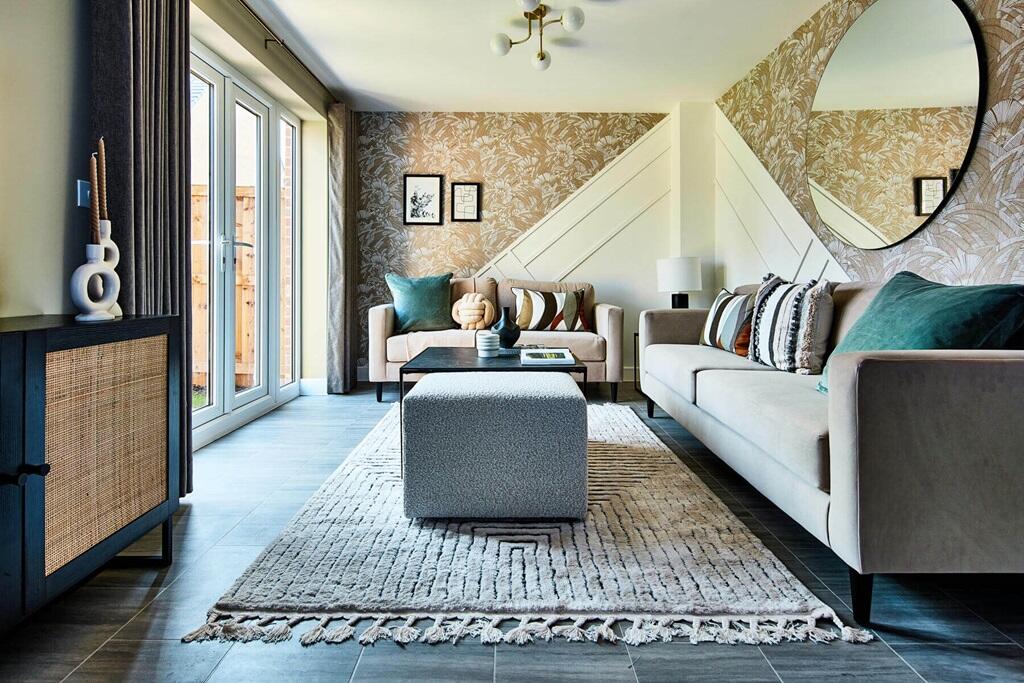 Patio doors lead out from the lounge to the garden - typical Taylor Wimpey home