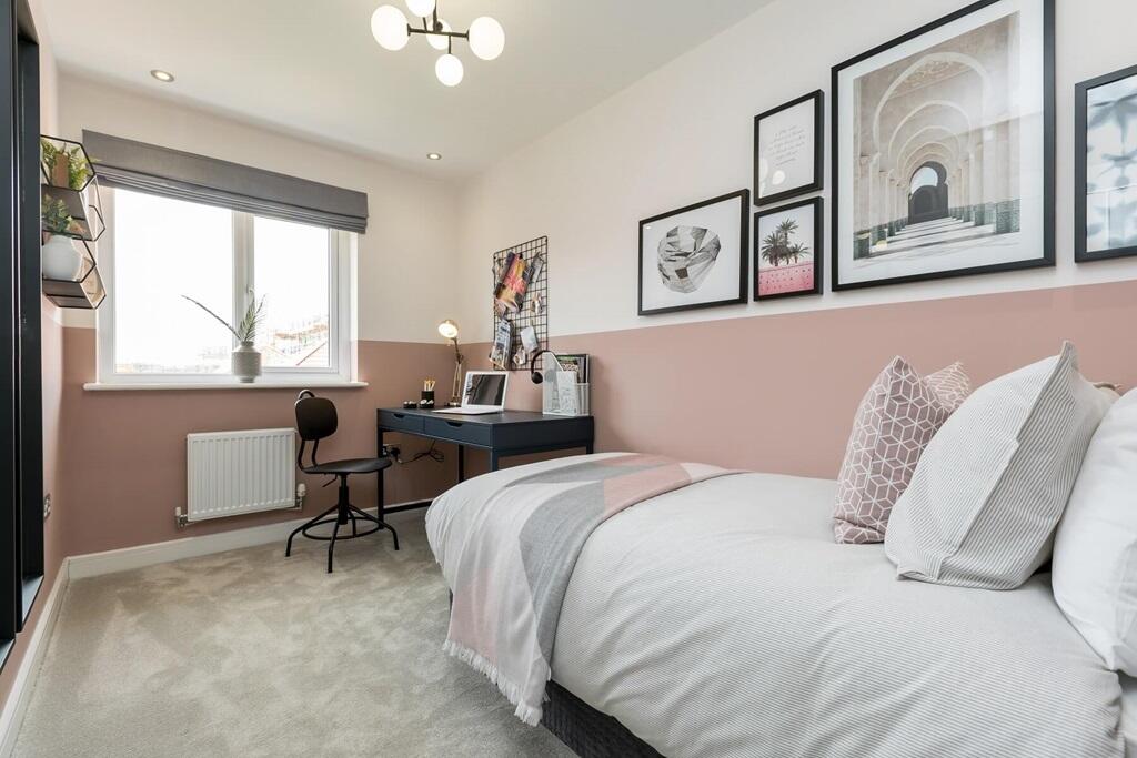 Bedroom 3 is well-suited to a child or even a home office