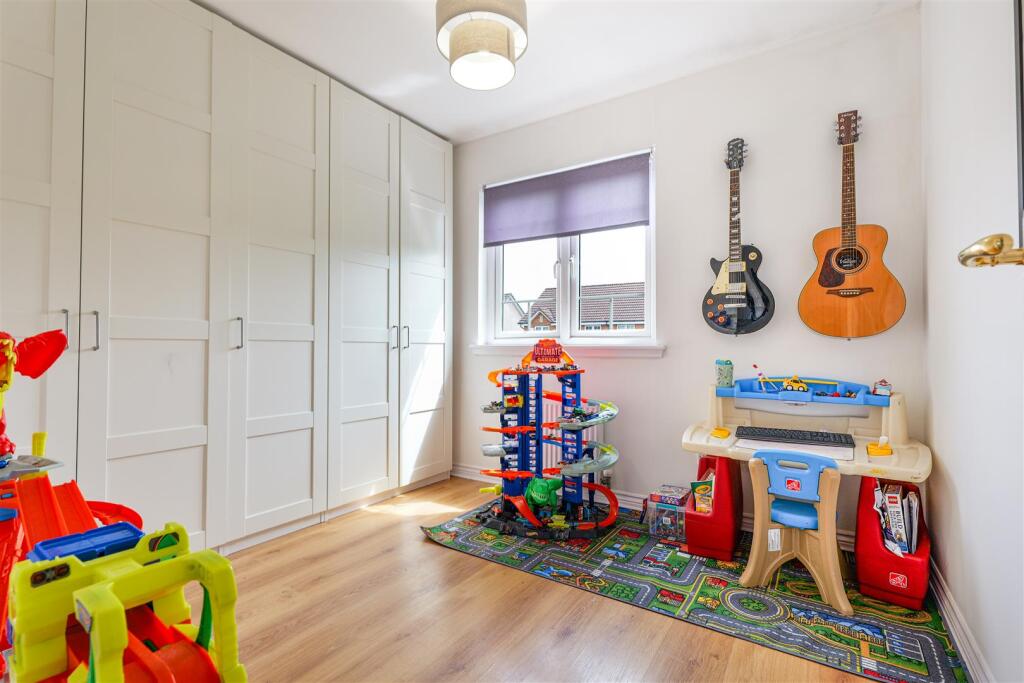 16- Bedroom Three.jpg