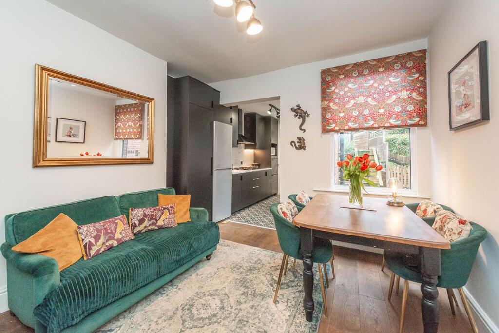 SITTING ROOM DINING ROOM AND KITCHEN