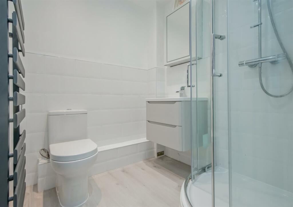 En-suite Sower Room / WC: