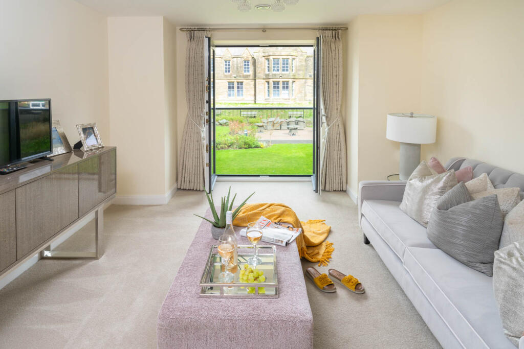Living room with view across gardens 
