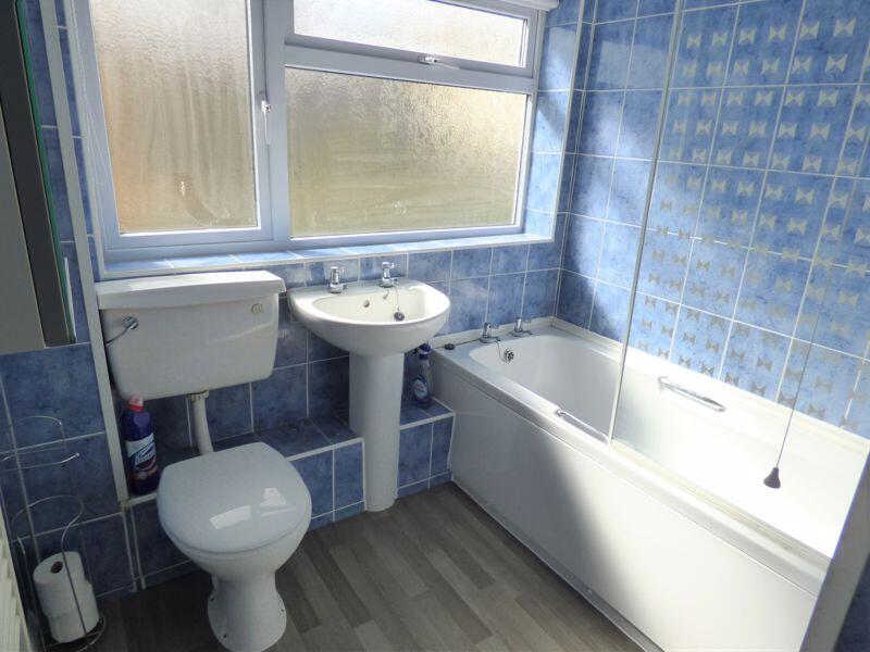 Bathroom (shown vacant 2023)