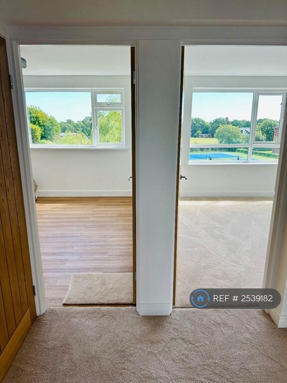Hallway View With Lounge And Bedroom 1 Doorways