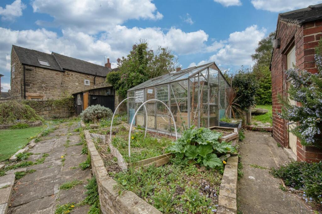 Greenhouse and path to rear garden.jpg