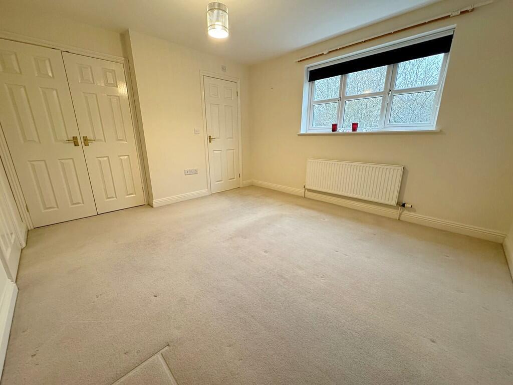 Bed 1 to wardrobe...