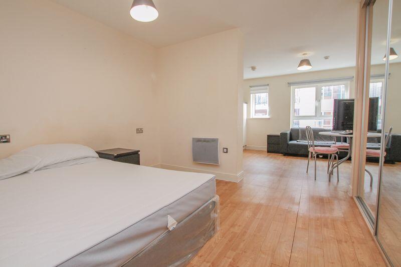 Bedroom Into Living Area