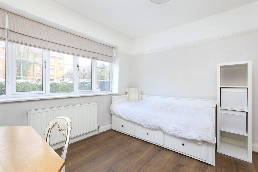 property in Chesham Court, 
Trinity Road, SW18