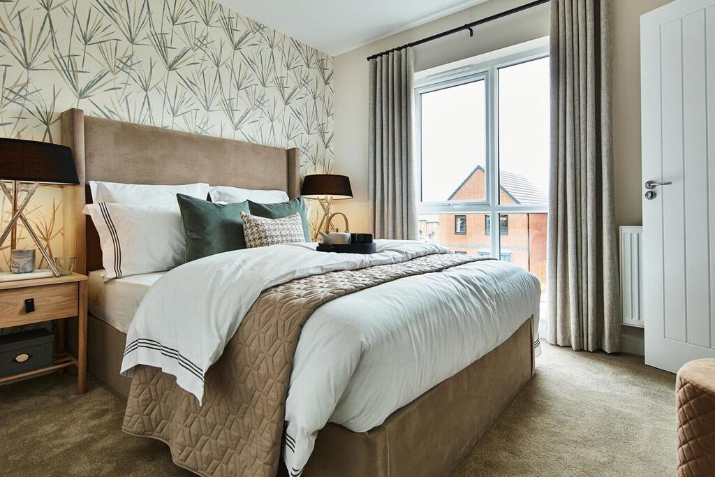 The king-size main bedroom has ample storage space