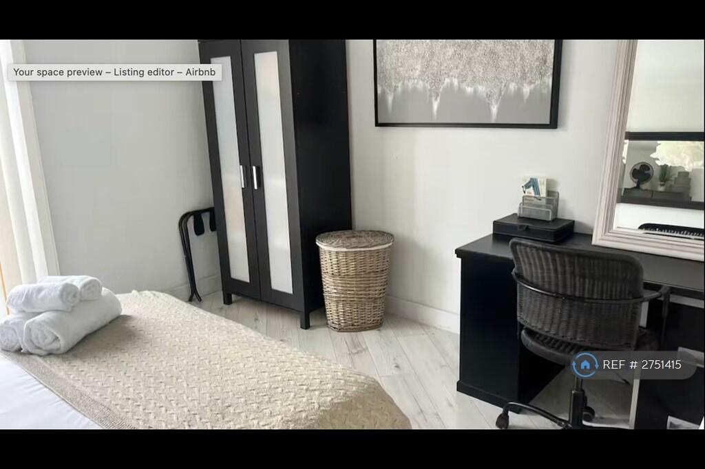 Desk, Storage King Bed In Second Bedroom 