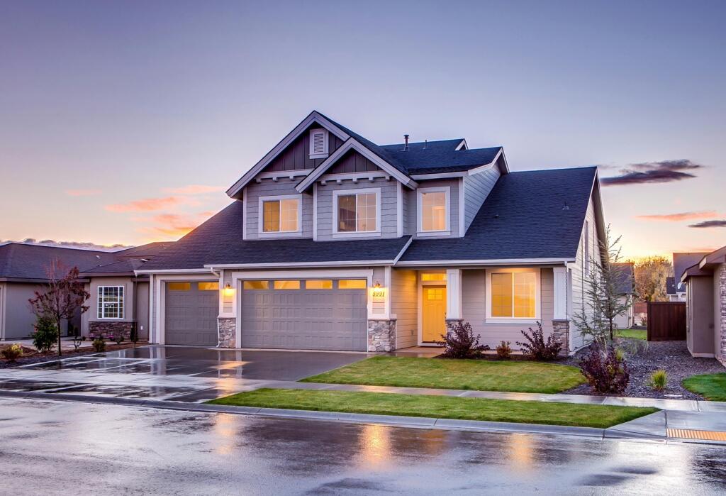 A modern house exterior with a well-maintained ...