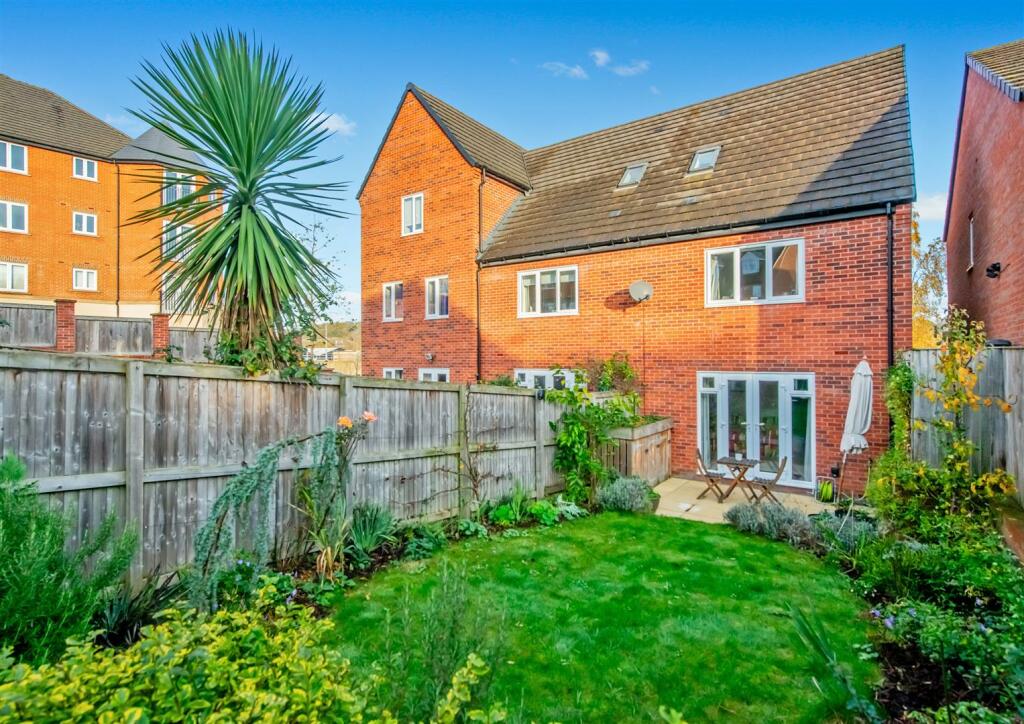 Gardens: Front &amp; Rear: