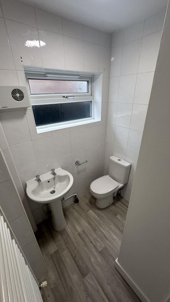 Photo 8- Shower room