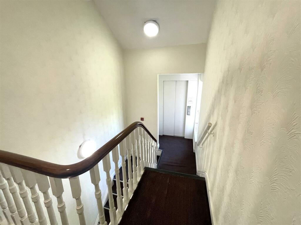 bannister leading to the lift .jpg