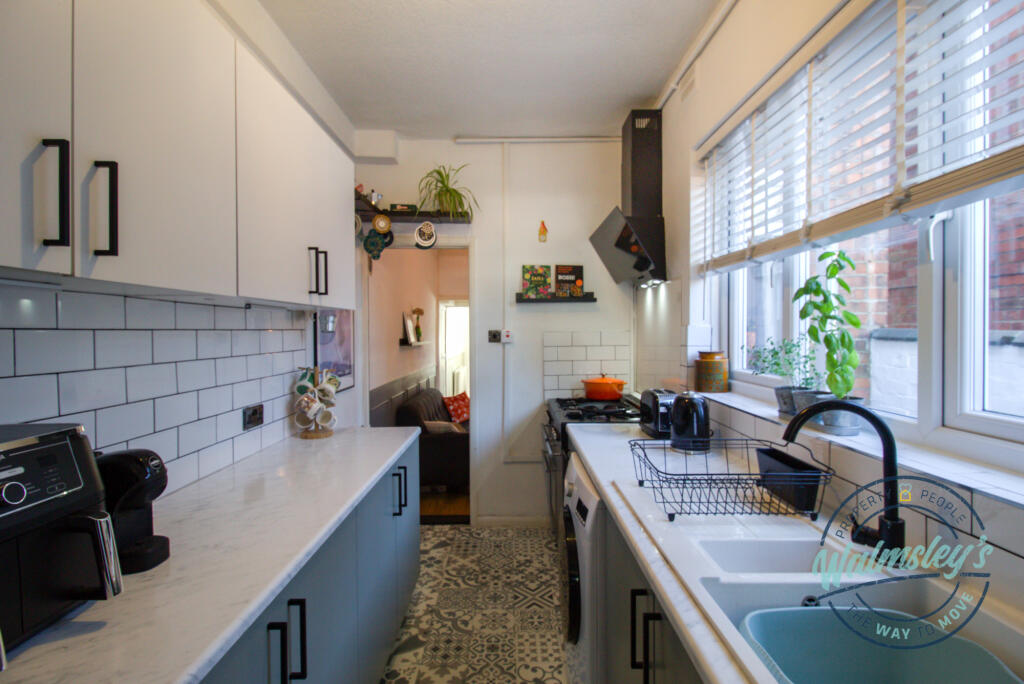 Kitchen towards rear reception