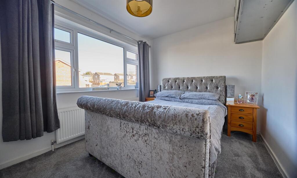 FRONT BEDROOM ONE