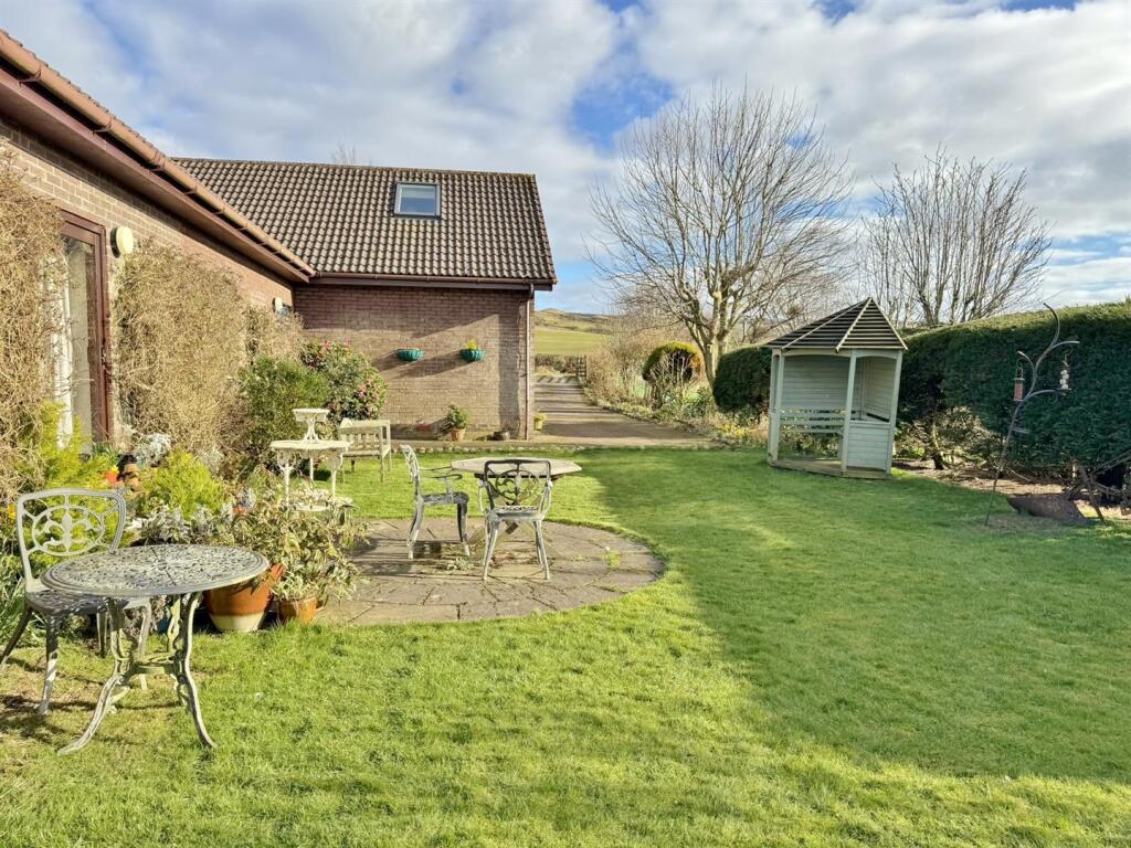 Patio and front gardens