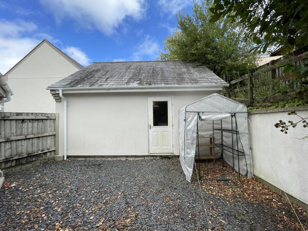 Ramsey Gardens 82 - Side Garden.jpg