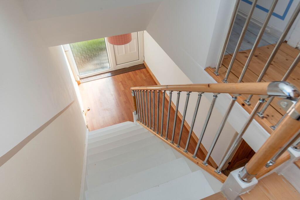 ENTRANCE HALLWAY AND LANDING