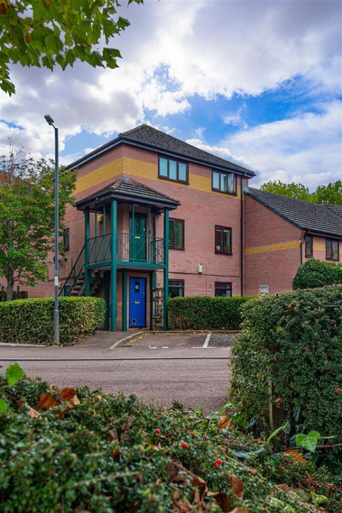 New Walls EXT portrait.jpg