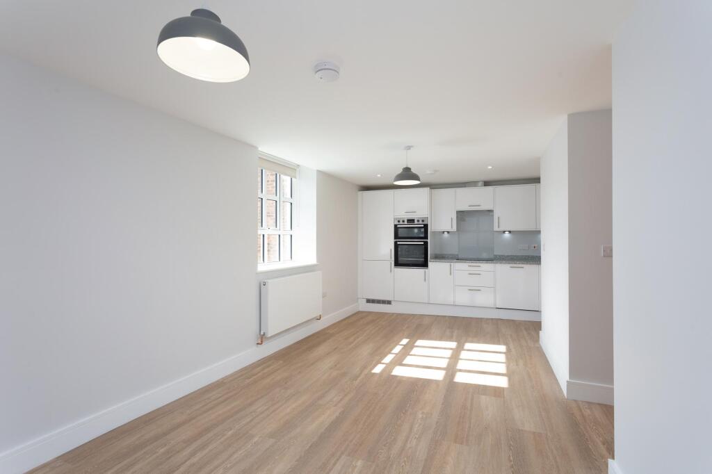 Open plan kitchen - dining - living