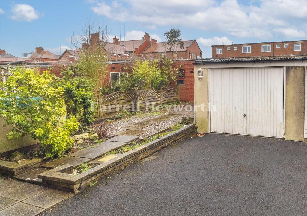 Garage and rear Gard