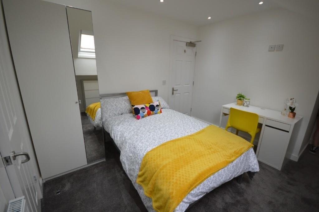 Bright and inviting double bedroom featuring a ...