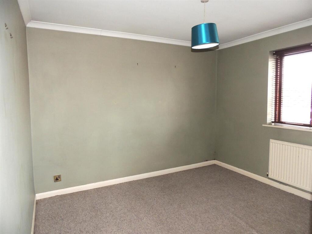 REAR BEDROOM