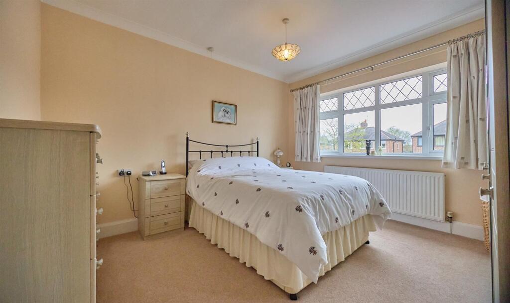FRONT BEDROOM ONE