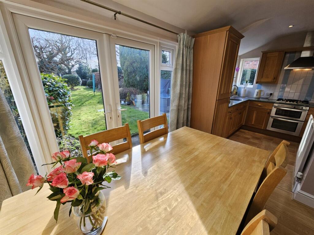 Dining Area to Kitchen