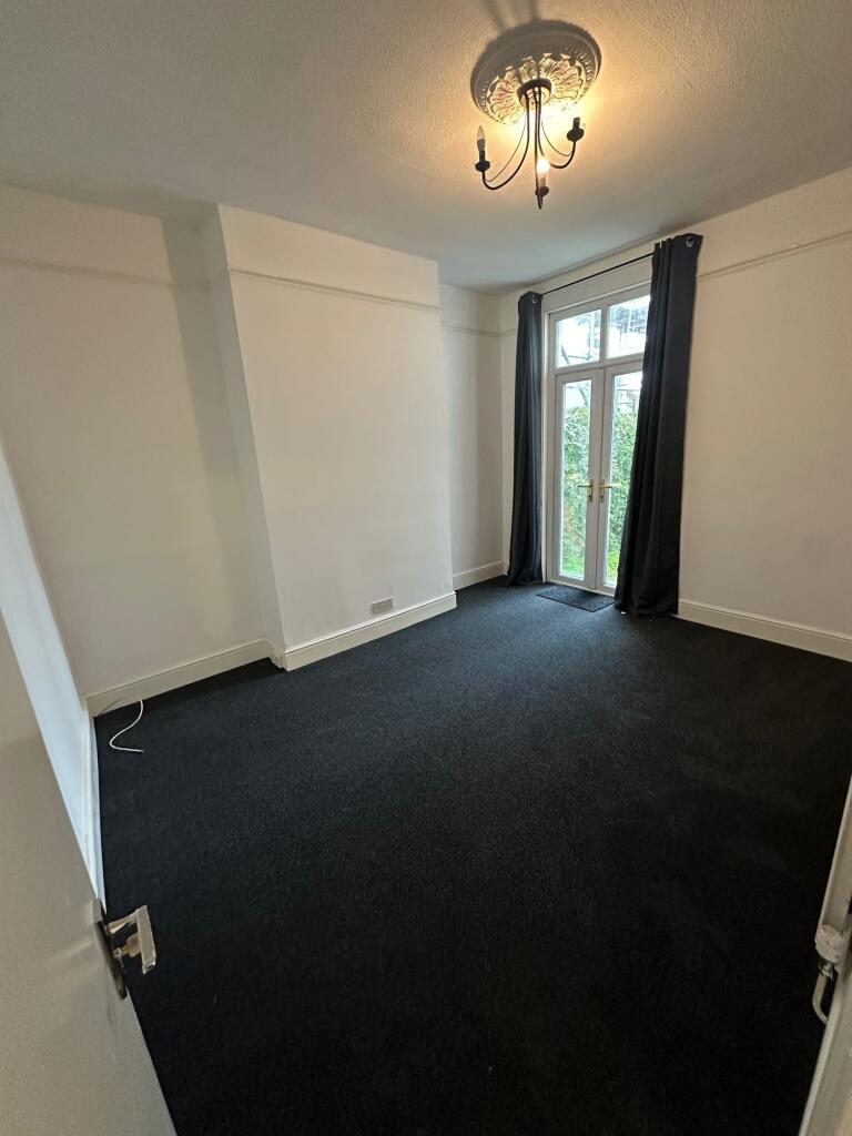 A clean and well-maintained single bedroom with...