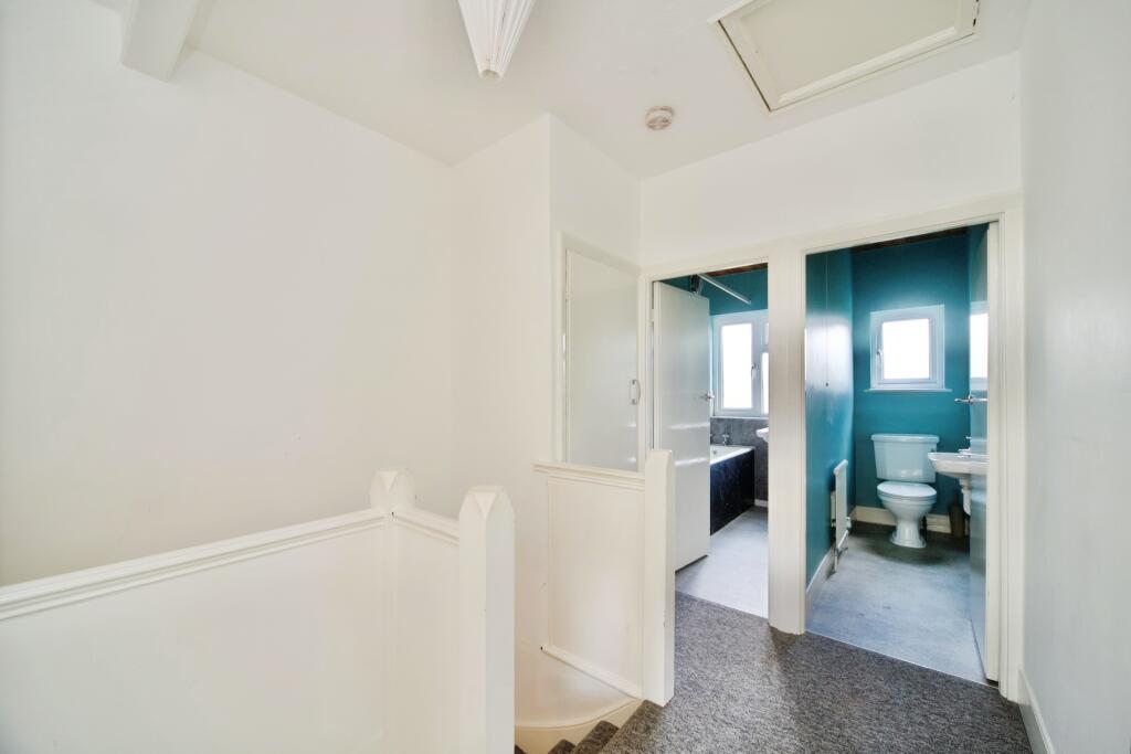 Landing view of bathroom and separate WC/Basin