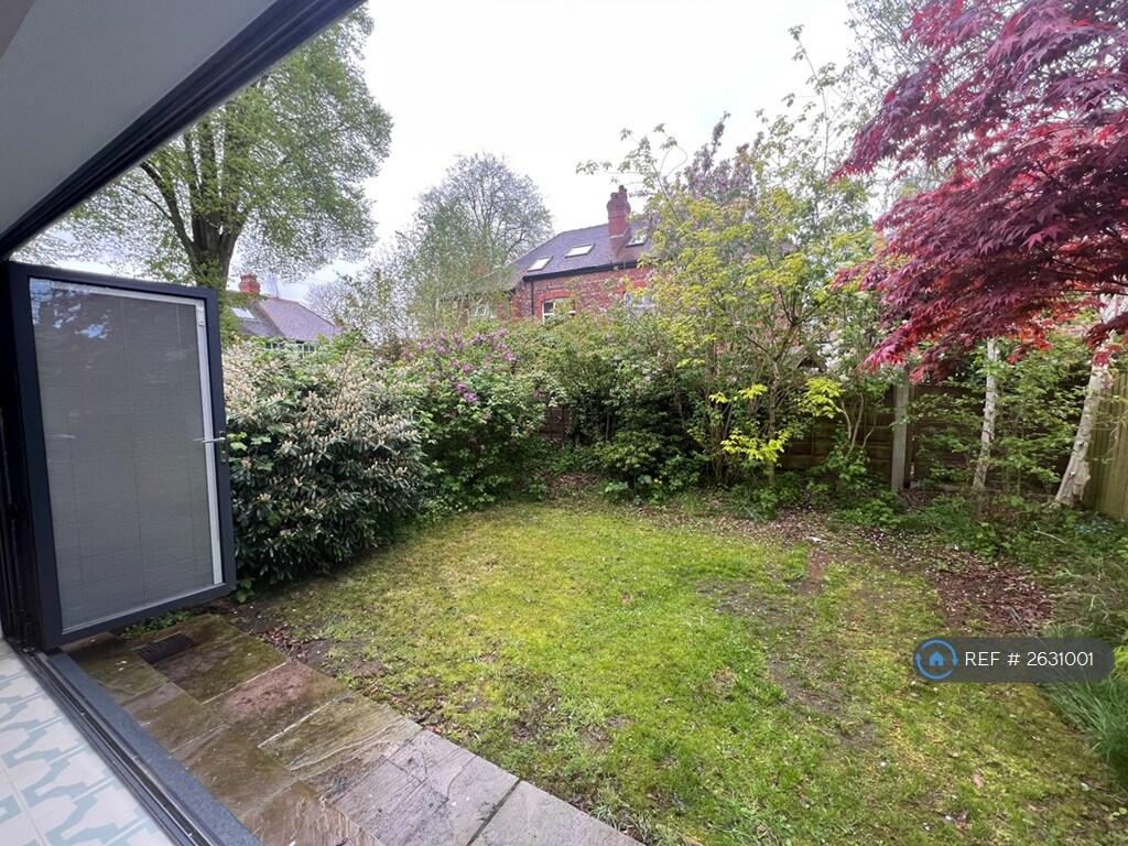 Rear Lawned Garden With Patio Area