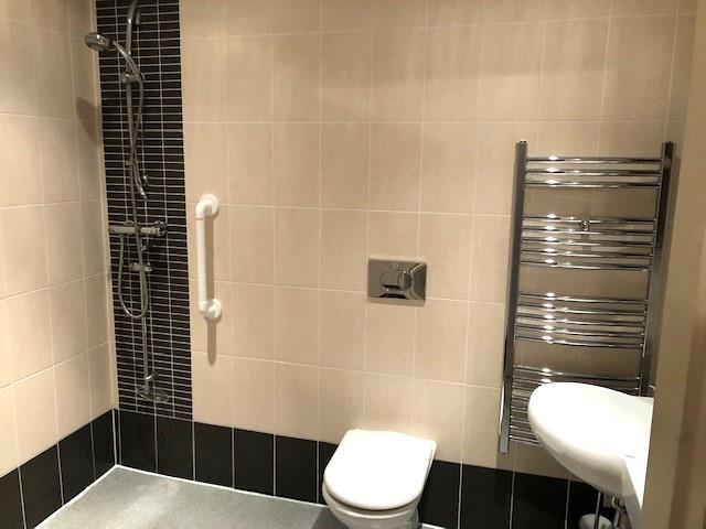FULLY TILED WET ROOM