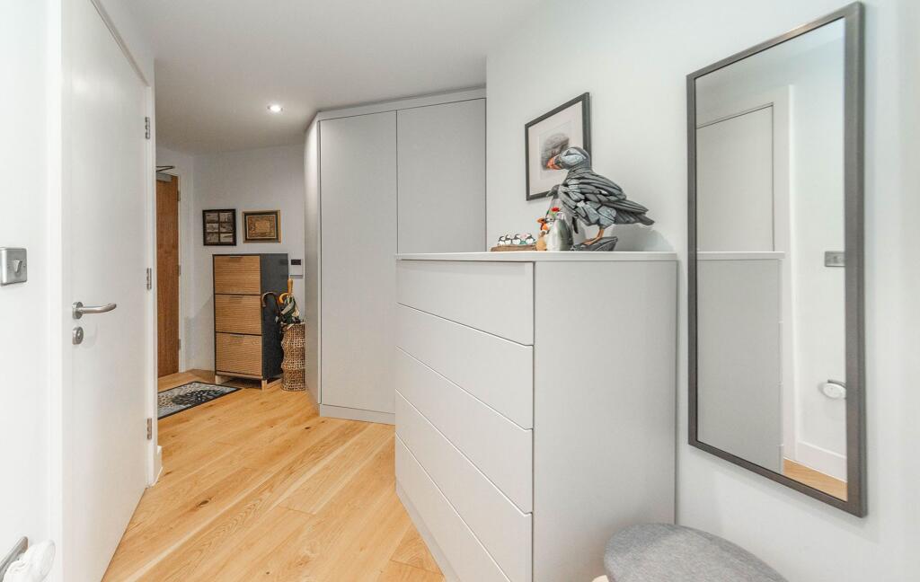 HALLWAY WITH ADDITIONAL BESPOKE STORAGE BUILT IN